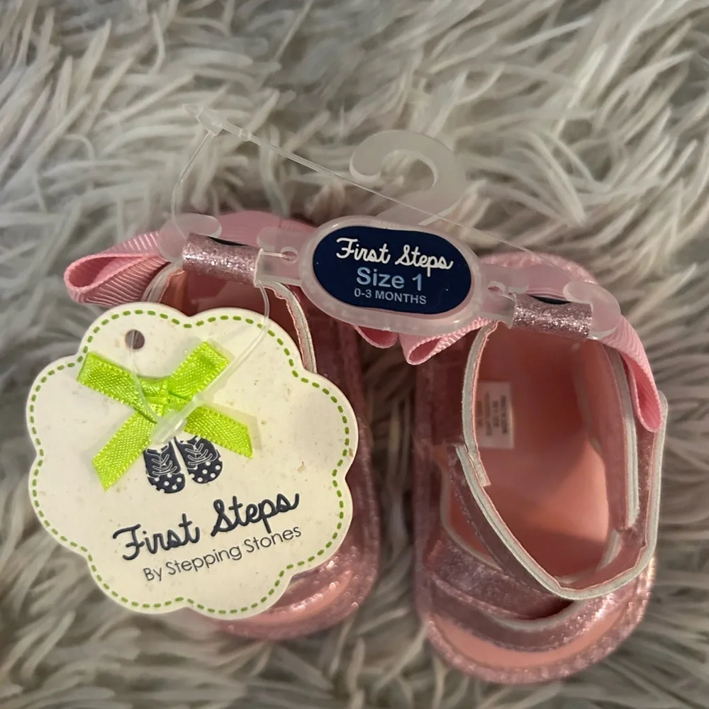 New with tags “First steps” Glittery Pink Kids Sandals. Size 1.